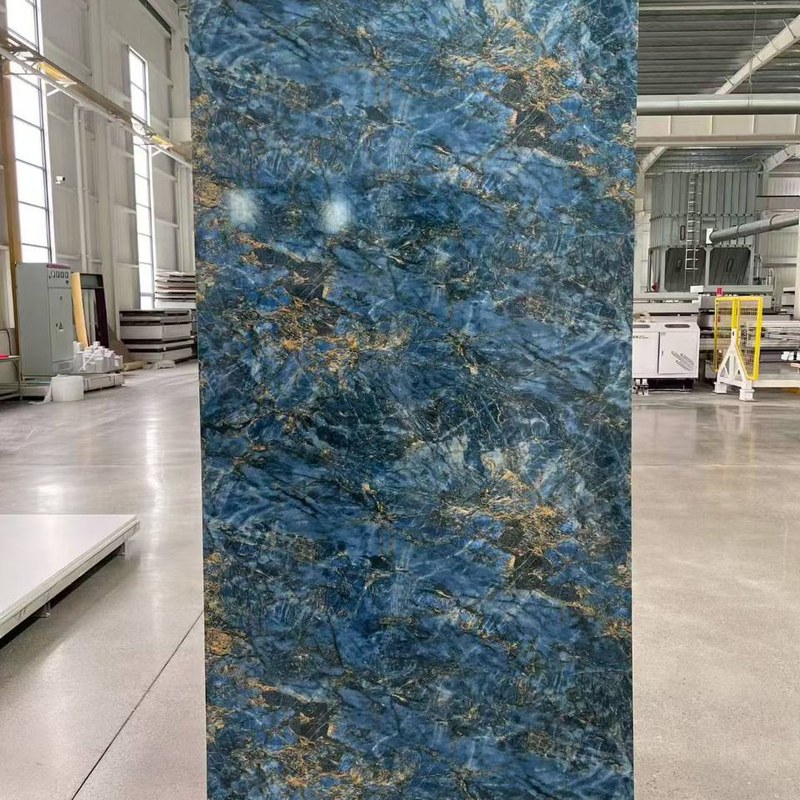 Smooth-face SPC wall panel in blue marble finish — VIGOU factory